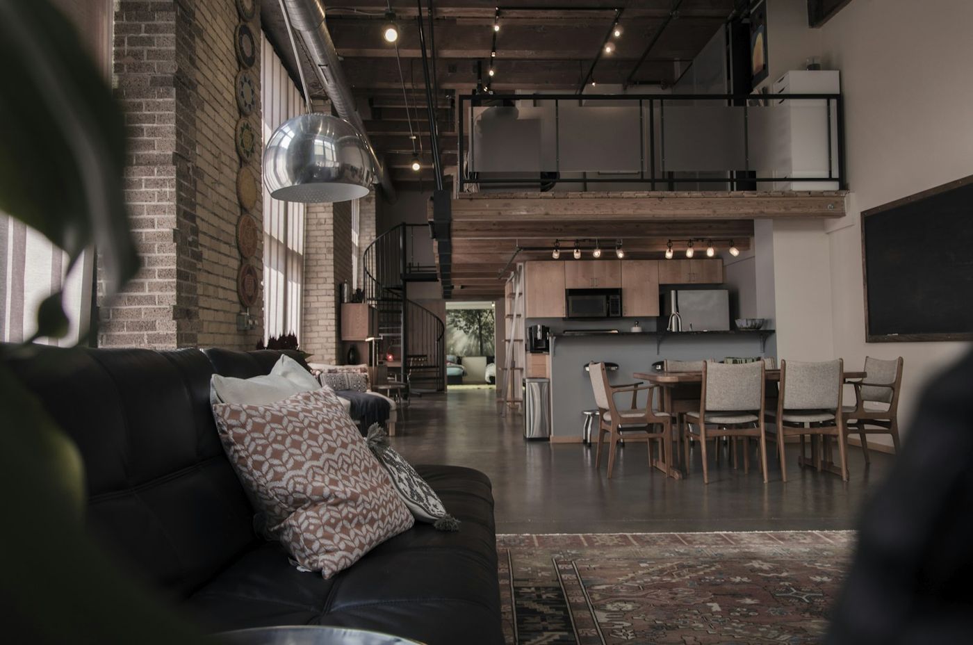 Modern apartment living room with loft window